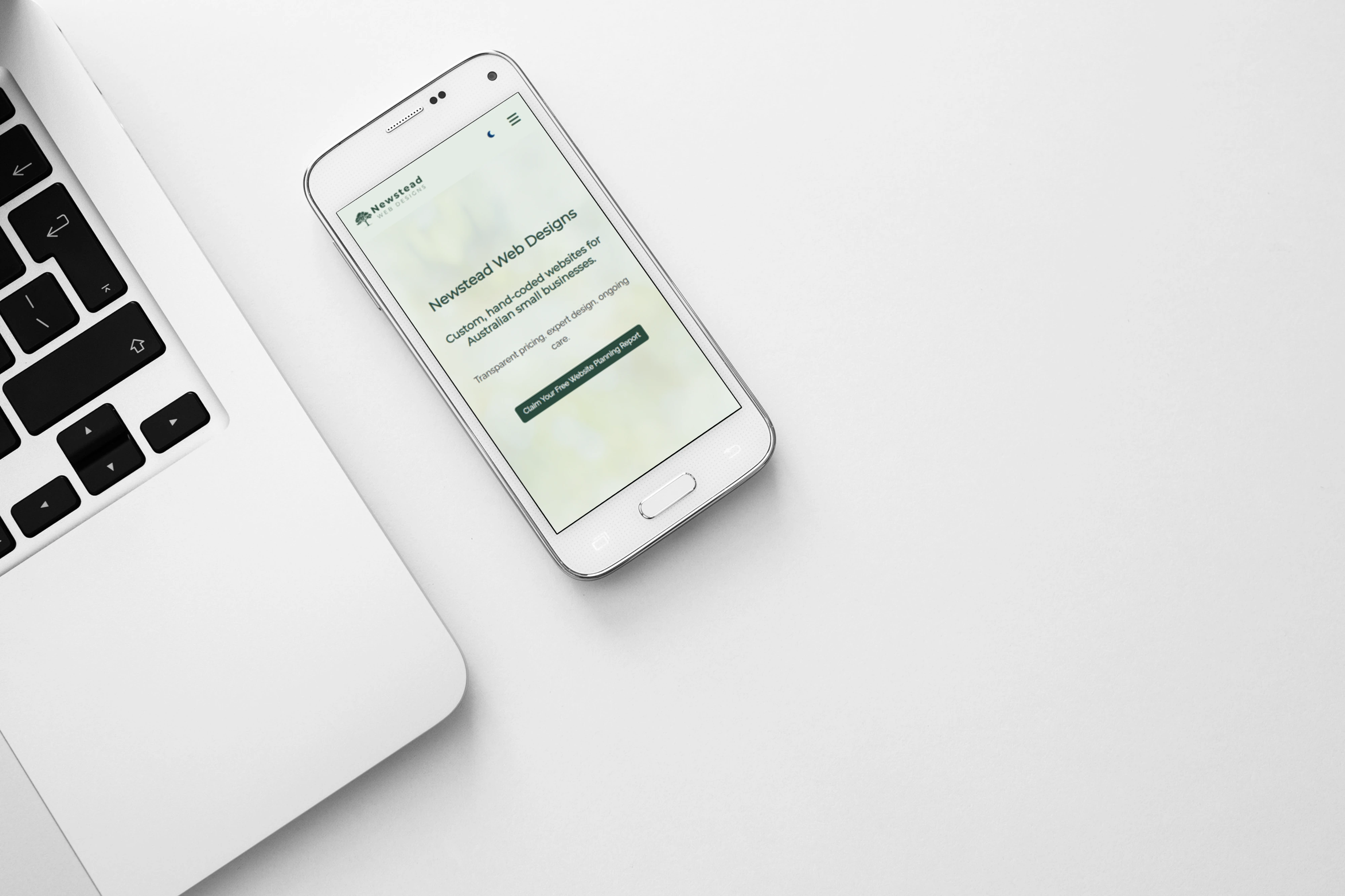 Newstead Web Designs website shown on a mobile device next to a laptop.